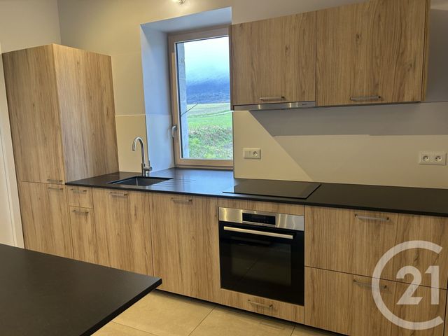 Appartement F2 bis à louer - 3 pièces - 95.72 m2 - PERON - 01 - RHONE-ALPES - Century 21 Adl Genevois